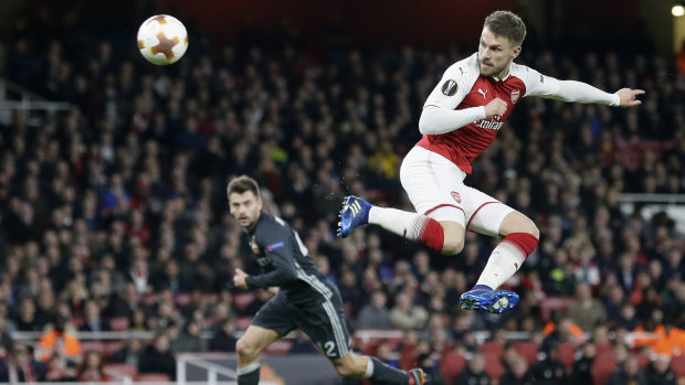 Arsenal's Aaron Ramsey scores the team's third goal against CSKA Moscow.