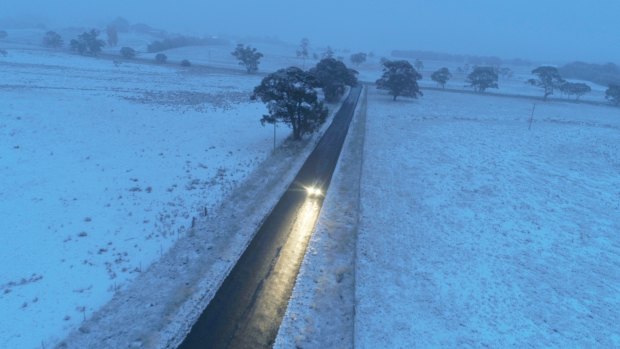 A truck drives through snow in Black Springs in the NSW Central Tablelands on Friday morning.