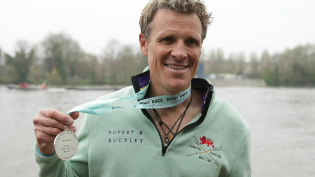 Cambridge's James Cracknell with his boat race medal.