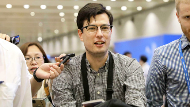 Australian student Alek Sigley arriving at the airport in Beijing after be was released from North Korea in July last year.