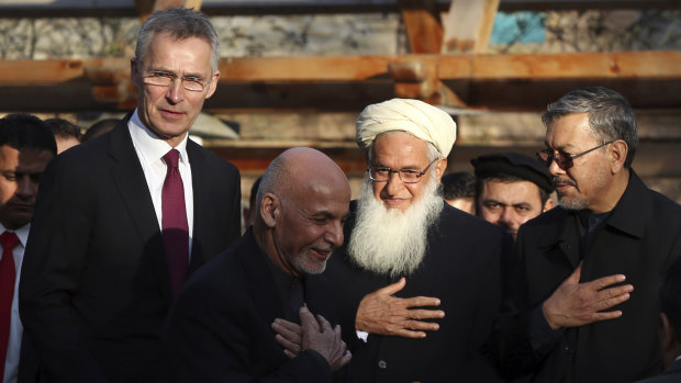Afghan President Ashraf Ghani (centre) with NATO Secretary General Jens Stoltenberg (left) at the presidential palace in Kabul on February 29, 2020.