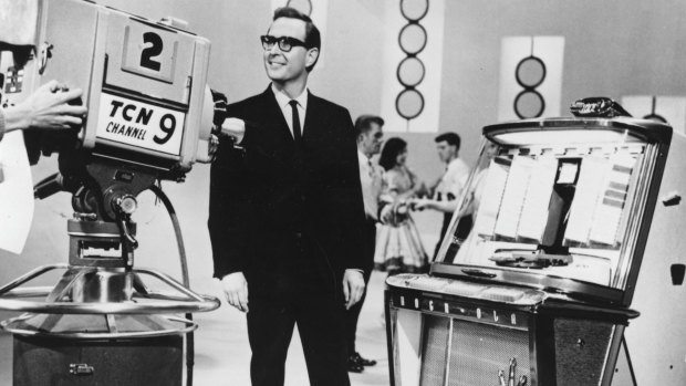 Host of Bandstand, and later the network's legendary newsreader, Brian Henderson in 1958.