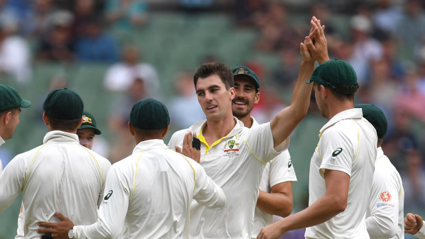 One-man show: Pat Cummins reacts after dismissing Mayank Agarwal to take his fifth wicket on his way to a haul of nine in the Boxing Day Test.
