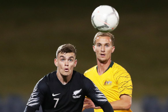 Myer Bevan and Tass Mourdoukoutas, right, in a U23 international friendly between Australian and New Zealand at Campbelltown Stadium in September.