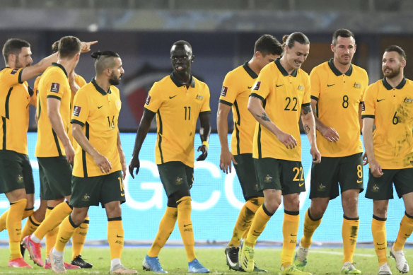 Jackson Irvine, third right, celebrates with the Socceroos after scoring against Kuwait in the previous qualifying round.