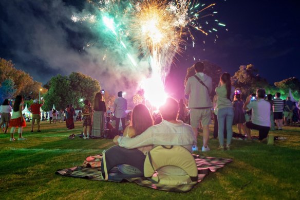 Families celebrating New Year’s Eve in Melbourne’s Alexander Gardens. 