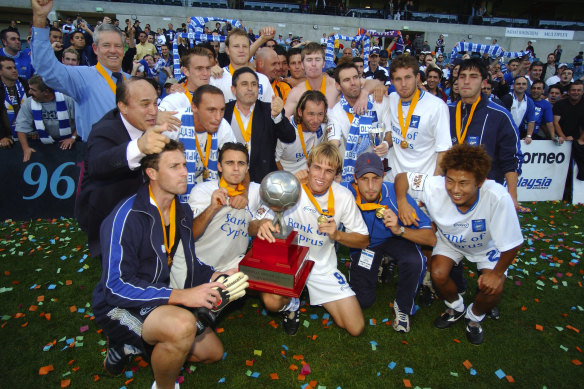 The Olympic Sharks, as they were then known, celebrate their 2002 NSL grand final win over Perth Glory.