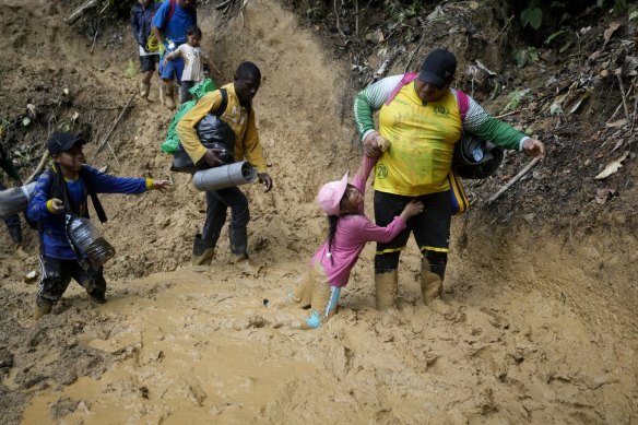 Ecuadorian migrants walk across treacherous jungle to reach the United States.
