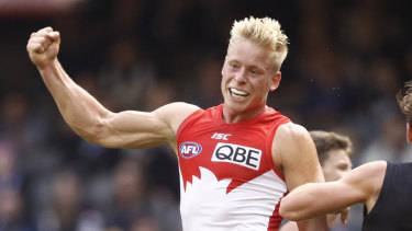 Happy days: Isaac Heeney celebrates a crucial goal against Carlton.