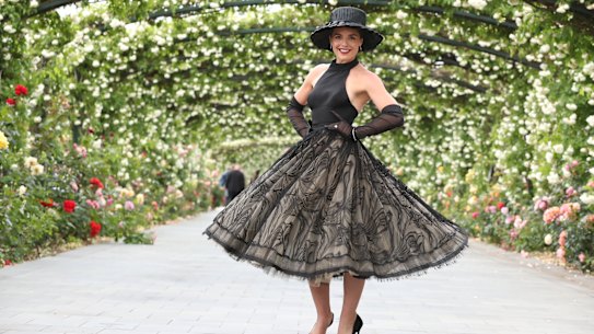 Olympia Vallance wins the soap opera invasion of Derby Day in a Sam Oglialoro dress.