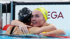 NANTERRE, FRANCE - JULY 27: Ariarne Titmus of Team Australia and Summer McIntosh of Team Canada at the end of the race.