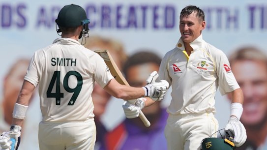 Marnus Labuschagne about to be embraced by Steve Smith. 