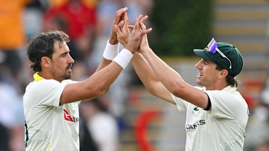 Mitchell Starc celebrates the wicket of Kagiso Rabada of South Africa.