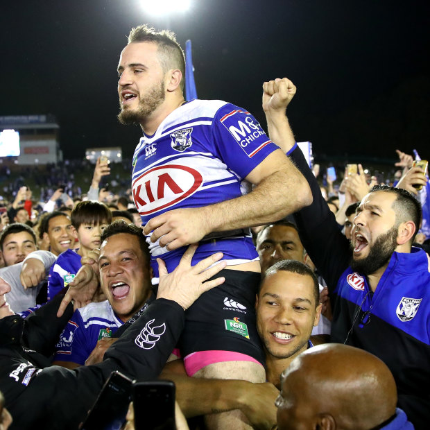 Josh Reynolds is chaired from Belmore Sportsground after his final game for his beloved Bulldogs in 2017.