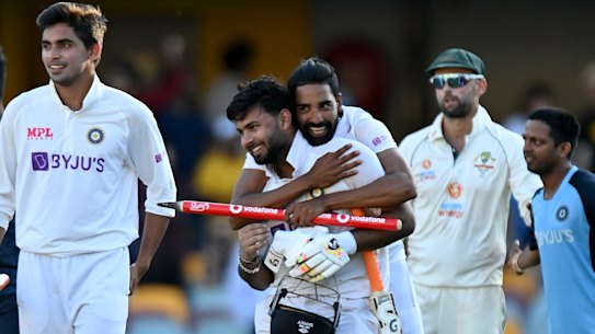 Rishabh Pant celebrates victory with his teammates.
