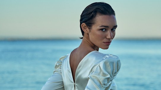 Frame blouse, $1025, and “The Bubble” jeans, $540.