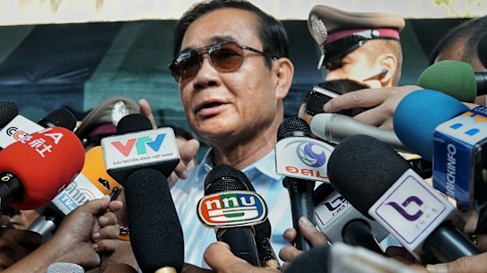 Thailand's Prime Minister Prayut Chan-o-cha addresses the media after voting on Sunday. 