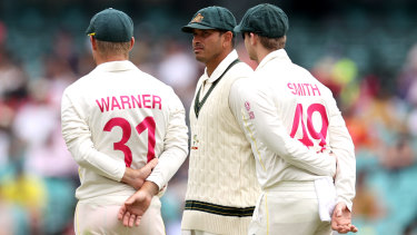 David Warner, Usman Khawaja and Steve Smith of Australia look on during day five of the fourth Test at the SCG.