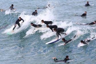 Lockdown restrictions saw crowds take to the water at Bondi Beach, 