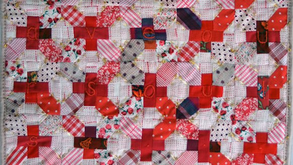 State of emergency, 2018, Michele England, screen printed reclaimed fabrics, brass safetypins, bandage, hospital blanket, 62 x 54cm, detail