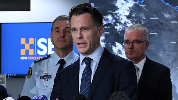 Premier Chris Minns with likely police commissioner Mal Lanyon, right, at a press conference about Cyclone Alfred in March 2025.