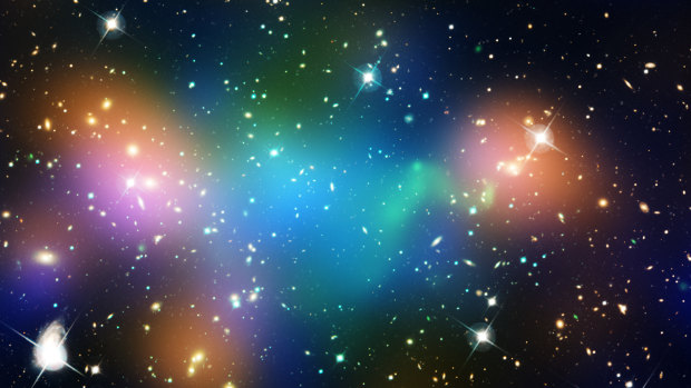 This composite image shows the distribution of dark matter, galaxies, and hot gas in the core of the merging galaxy cluster Abell 520, formed from a violent collision of massive galaxy clusters. 
