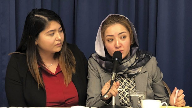 Mihrigul Tursun, right, a member of China’s Uighur minority, detailed the torture and abuse she suffered at the hands Chinese authorities at the National Press Club in Washington on Monday.