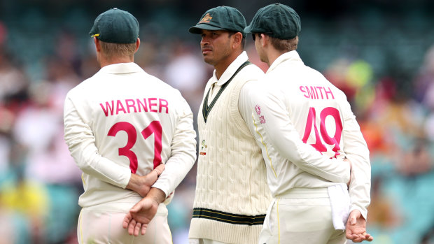 David Warner, Usman Khawaja and Steve Smith of Australia look on during day five of the fourth Test at the SCG.