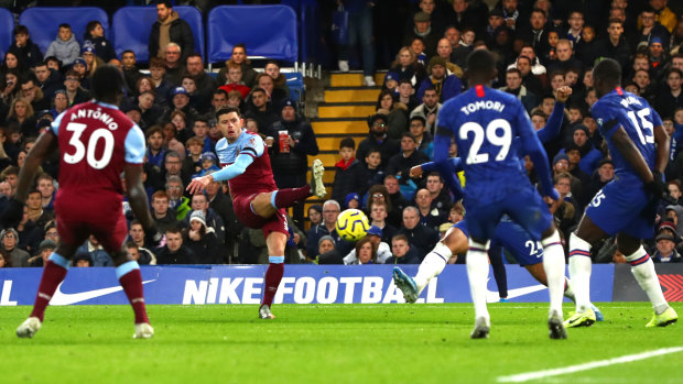 Aaron Cresswell of West Ham United scores against Chelsea at Stamford Bridge.