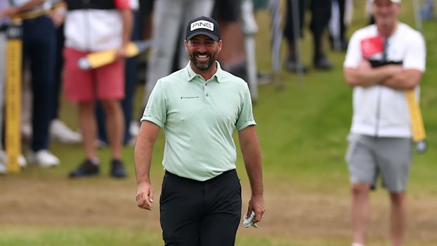 John Parry reacts after a hole in one on the 13th hole.