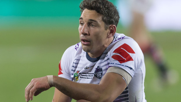 Anticlimax: Billy Slater on his haunches after a Roosters try.
