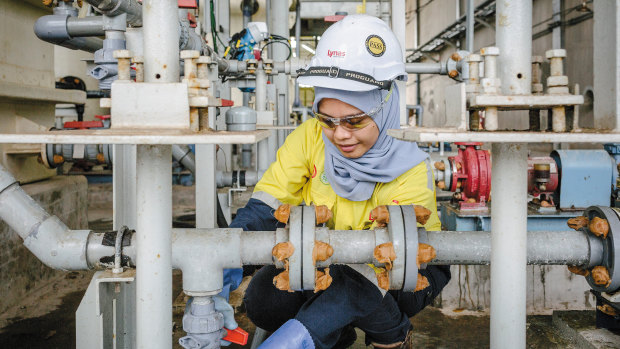 An employee at work in Lynas'  processing plant in Malaysia.