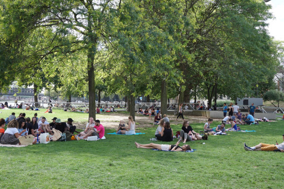 In Paris, locals take respite from the heat in one of the city’s many parks.