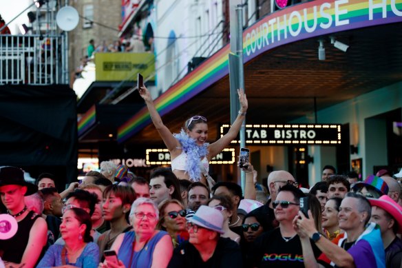 Crowds enjoying the Mardi Gras atmosphere.