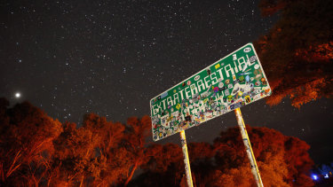 A sign advertises state route 375 as the Extraterrestrial Highway, in Crystal Springs, Nevada.