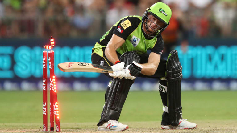 Swept away: Jos Butler is dismissed after hitting his own wicket while batting for Sydney Thunder against Perth Scorchers.