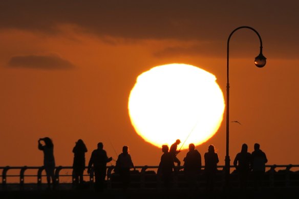 Triple the heat deaths, rising seas and vanishing workdays, report warns