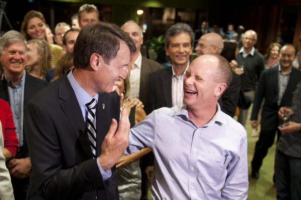 Then lord mayor Graham Quirk (left) with his predecessor, Campbell Newman, after securing a new term in 2012. Weeks earlier, Newman was elected premier of Queensland.