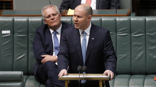Treasurer Josh Frydenberg hands down the federal budget in early October, showing the largest deficit on record. States and territories have followed him into debt and deficit.
