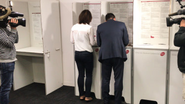 Matthew Guy and his wife Renae cast their votes 10 days ahead of the November 24 election. 