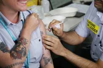 The Queensland government has defended its vaccination program after confirming a doctor working in a COVID-19 ward at Princess Alexandra Hospital had not been inoculated.