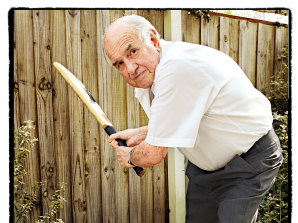 Former Australian test cricket opener Colin McDonald strikes his batman’s stance. 