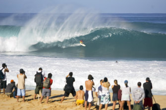 Pipeline is a hugely powerful wave that breaks over a shallow reef.