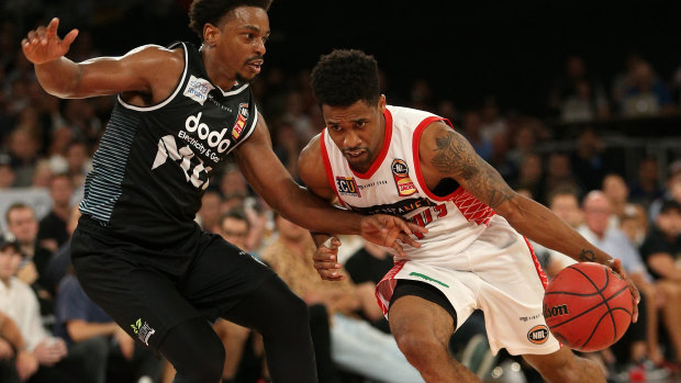 Bryce Cotton takes on Casper Ware of Melbourne during the Round 18 match between Melbourne United and the Perth Wildcats.