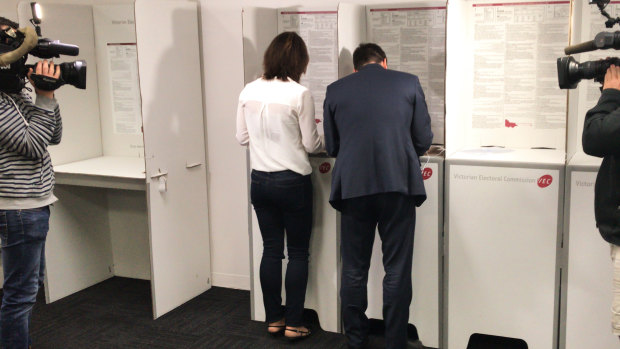Matthew Guy and his wife Renae cast their votes 10 days ahead of the November 24 election. 