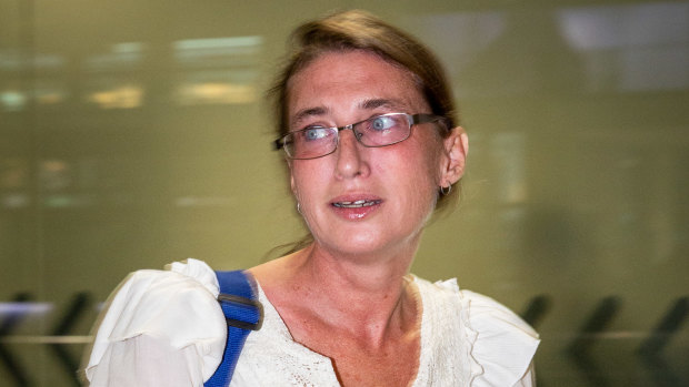 Yoshe Ann Taylor arrives at Brisbane airport on Thursday morning.