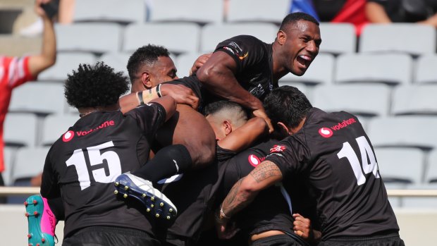 Fiji celebrate during their dominant performance against Samoa at Eden Park.