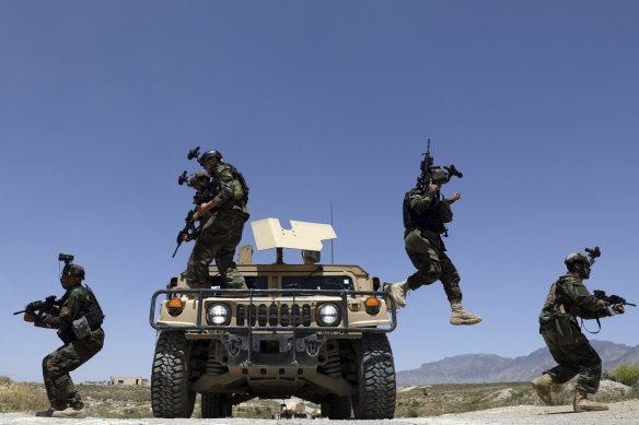 Afghan soldiers patrol outside their military base on the outskirts of Kabul, Afghanistan, last month. By September11 the remaining U.S.and allied NATO forces will leave the country, ending nearly 20 years of military engagement. 