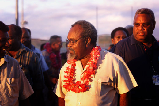 Sir Michael Somare, leader of the National Alliance at Port Moresby domestic airport in 2015.
