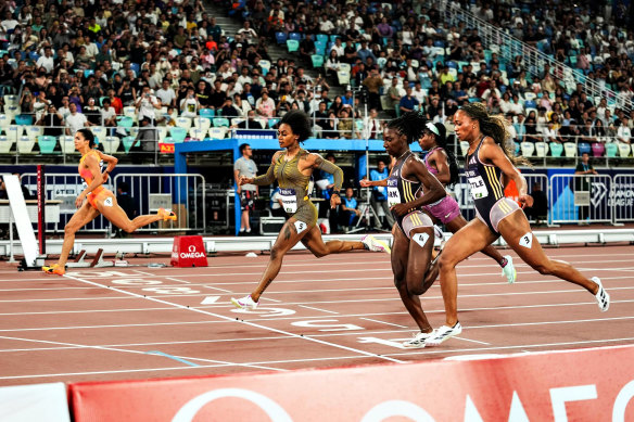 Torrie Lewis (far left) pips Sha’Carri Richardson (centre) to the line in the 200m in China.